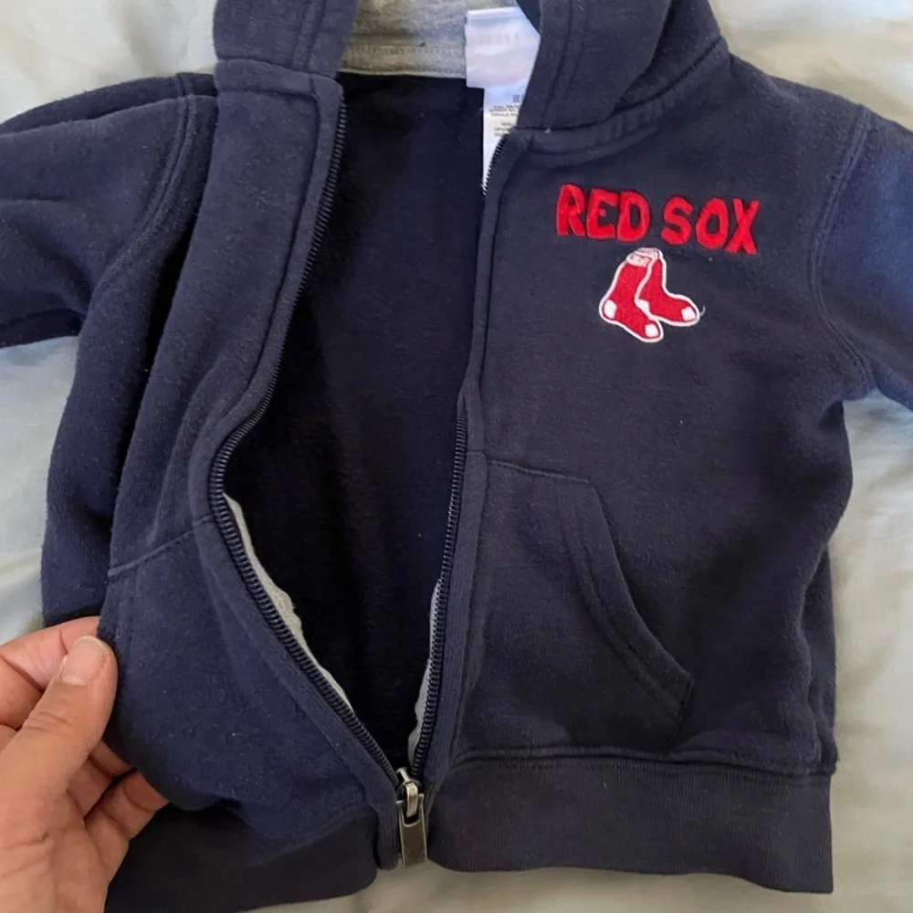 Genuine Merchandise official red